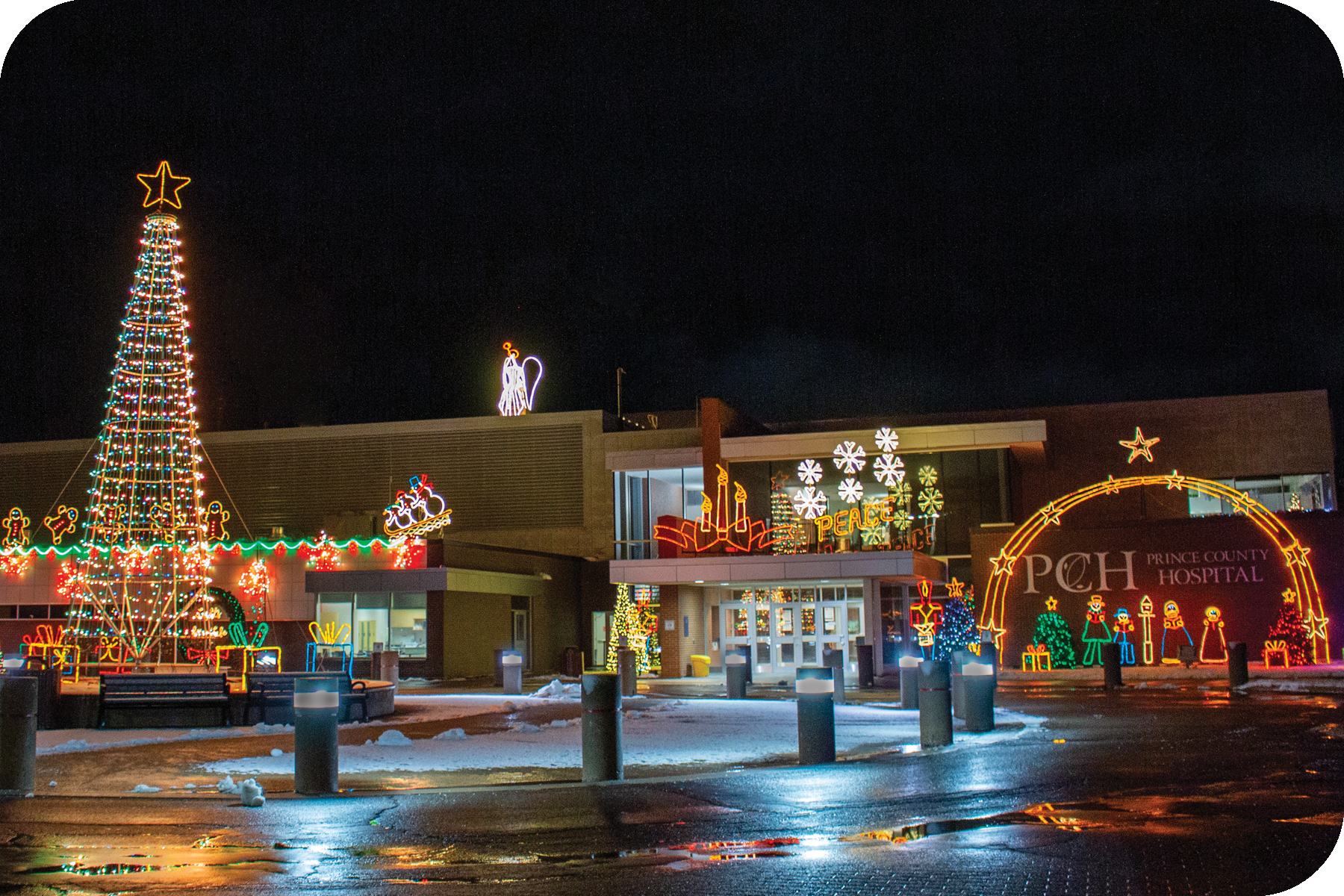 Out side of hospital at night with lights